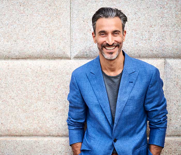 A mature man smiling